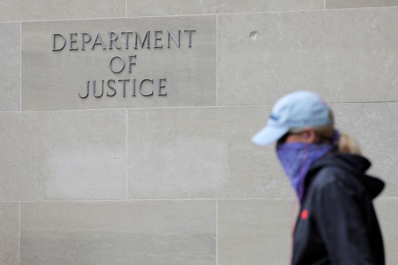 &copy; Reuters. FILE PHOTO: Signage is seen at the headquarters of the United States Department of Justice (DOJ) in Washington, D.C., U.S., May 10, 2021. REUTERS/Andrew Kelly/File Photo