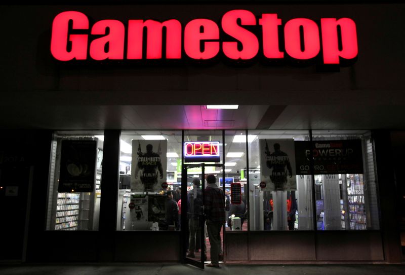 &copy; Reuters. FILE PHOTO: People enter a GameStop store during "Black Friday" sales in Carle Place, New York November 25, 2011. REUTERS/Shannon Stapleton/File Photo