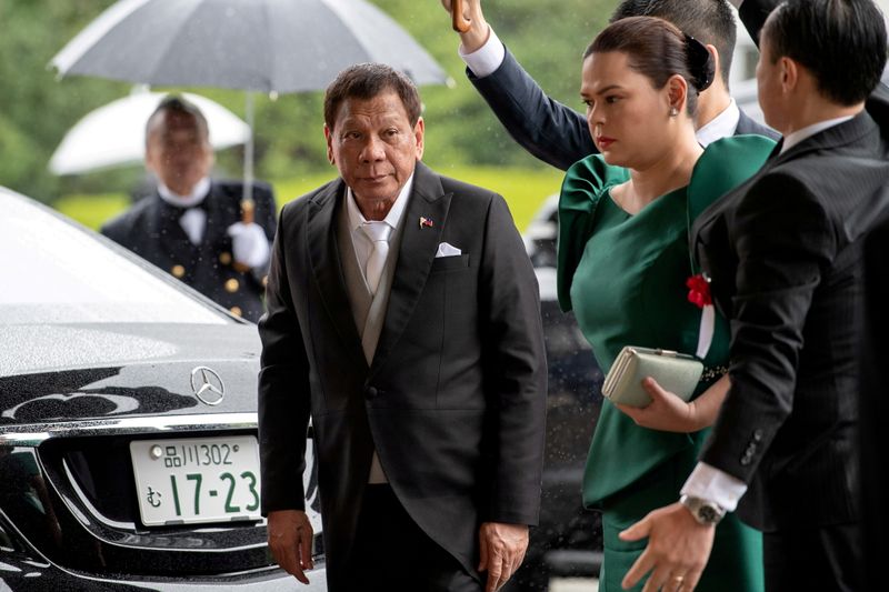 &copy; Reuters. FILE PHOTO: Philippines President Rodrigo Duterte arrives with daughter and first lady Sara Duterte-Carpio to attend the enthronement ceremony of Japan's Emperor Naruhito in Tokyo, Japan October 22, 2019.  Carl Court/Pool via REUTERS