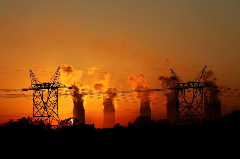 &copy; Reuters. FILE PHOTO: Electricity pylons are seen in front of the cooling towers at the Lethabo Thermal Power Station,an Eskom coal-burning power station near Sasolburg in the northern Free State province, March 2, 2016. REUTERS/Siphiwe Sibeko/File Photo/File Photo