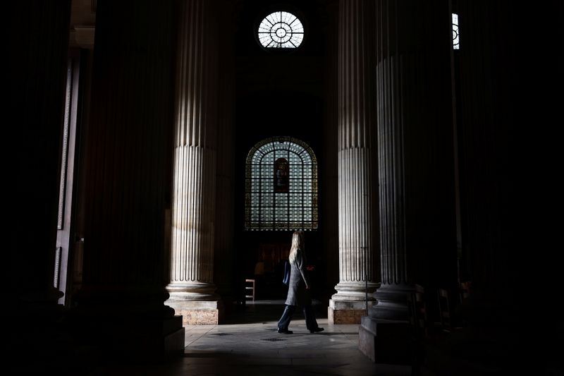 &copy; Reuters. A woman walks into the Saint-Sulpice church in Paris, France, October 4, 2021. REUTERS/Sarah Meyssonnier