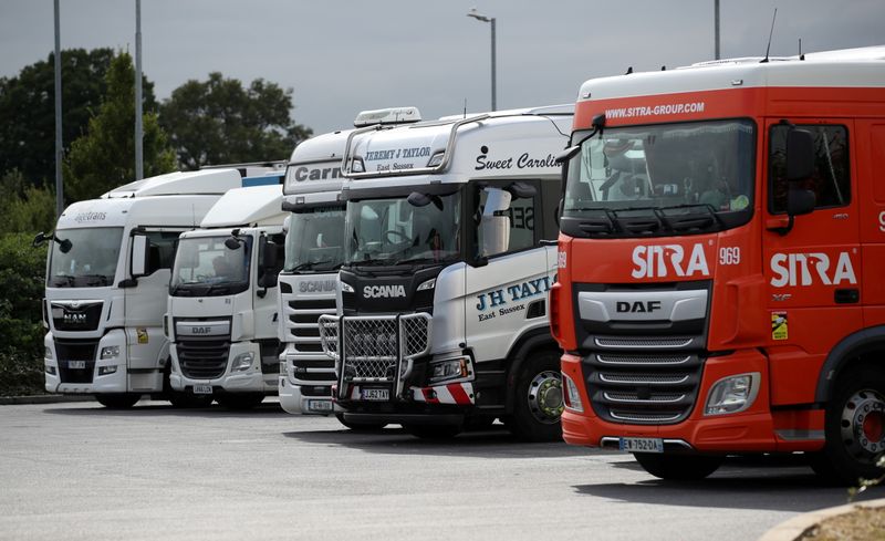 &copy; Reuters. FILE PHOTO: Trucks are seen at an HGV parking, at Cobham services on the M25 motorway, Cobham, Britain, August 31, 2021. REUTERS/Peter Cziborra/File Photo