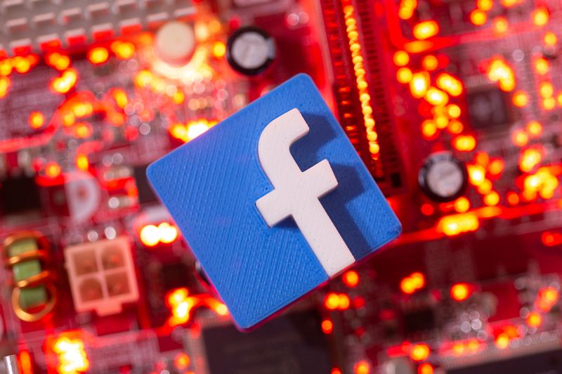 &copy; Reuters. A 3D printed Facebook logo is placed on a computer motherboard in this illustration taken January 21, 2021. REUTERS/Dado Ruvic/Illustration