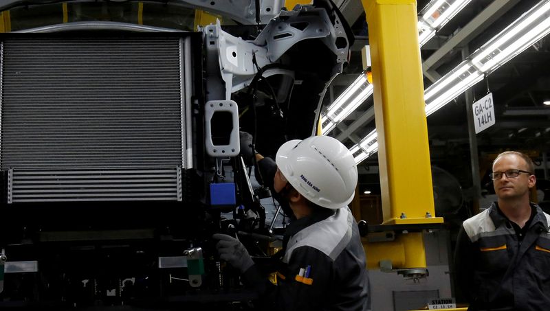 &copy; Reuters. FILE PHOTO: A man works at an assembly line of Vinfast Auto factory in Hai Phong city, Vietnam, June 14, 2019. REUTERS/Kham