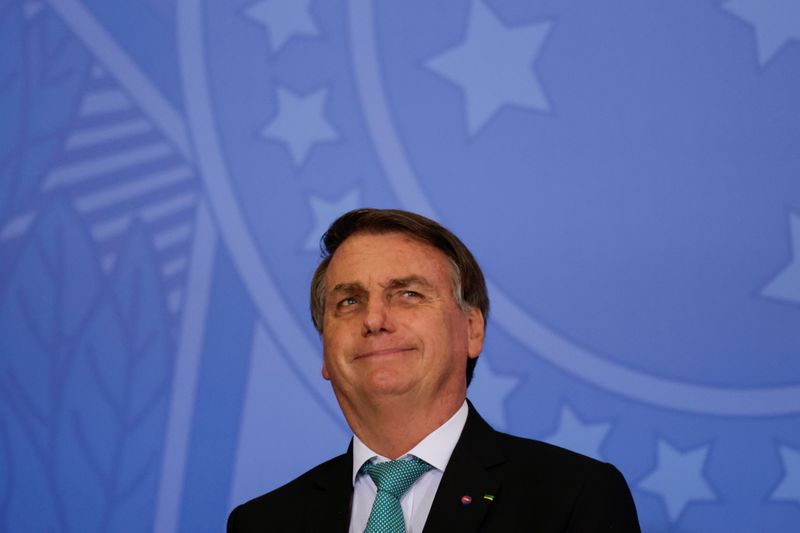 &copy; Reuters. Presidente Jair Bolsonaro durante cerimônia  no Palácio do Planalto
27/09/2021 REUTERS/Ueslei Marcelino