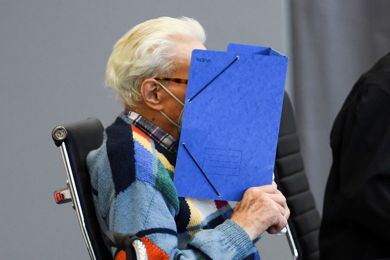 &copy; Reuters. A 100-year-old former security guard of the Sachsenhausen concentration camp appears in the courtroom before his trial at the Landgericht Neuruppin court in Brandenburg, Germany, October 7, 2021.  REUTERS/Annegret Hilse