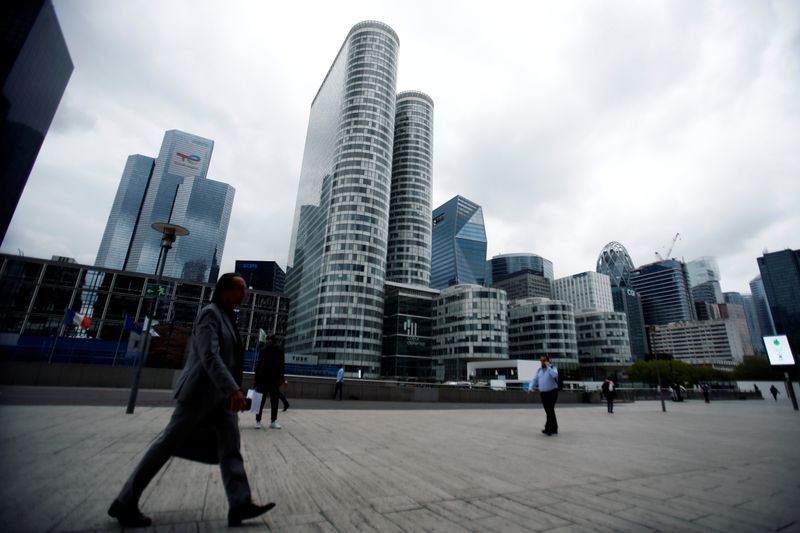 &copy; Reuters. FILE PHOTO: People walk through the financial and business district of La Defense in Puteaux near Paris, France, August 23, 2021. REUTERS/Sarah Meyssonnier