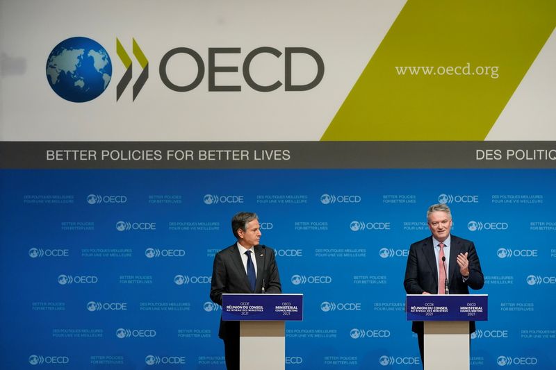 &copy; Reuters. U.S. Secretary of State Antony Blinken listens as Mathias Cormann, Secretary-General of the Organization for Economic Cooperation and Development, speaks during a press briefing at the OECD's Ministerial Council Meeting, in Paris, France October 6, 2021. 