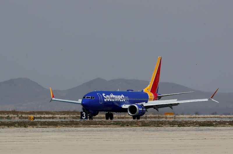 &copy; Reuters. FILE PHOTO: A Southwest Airline Boeing 737 MAX 8 aircraft lands at Victorville Airport in Victorville, California, U.S., March 26, 2019.  REUTERS/Mike Blake