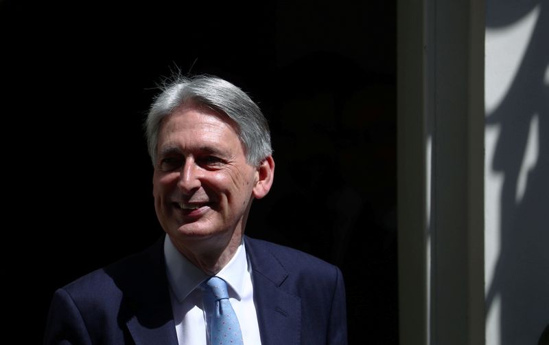 &copy; Reuters. FILE PHOTO: Chancellor of the Exchequer Philip Hammond leaves Downing Street in London, Britain, July 24, 2019. REUTERS/Hannah McKay