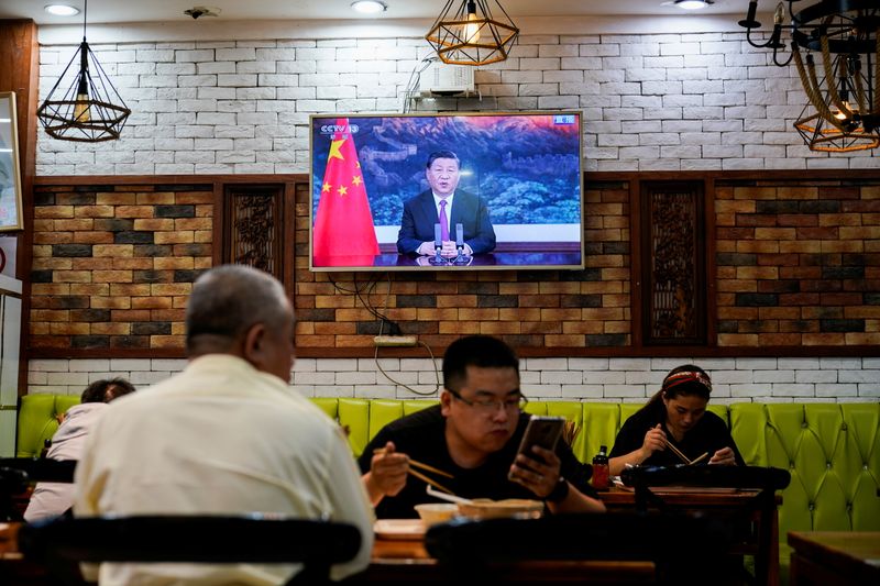 &copy; Reuters. Chinese President Xi Jinping speaks via video link at the opening ceremony of the 2021 China International Fair for Trade in Services (CIFTIS) held in Beijing, at a restaurant in Shanghai, China September 2, 2021. REUTERS/Aly Song