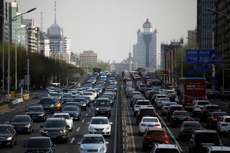 &copy; Reuters. Cars are seen in a traffic jam during evening rush hour in Beijing, as the country is hit by an outbreak of the novel coronavirus disease (COVID-19), China April 8, 2020. REUTERS/Tingshu Wang