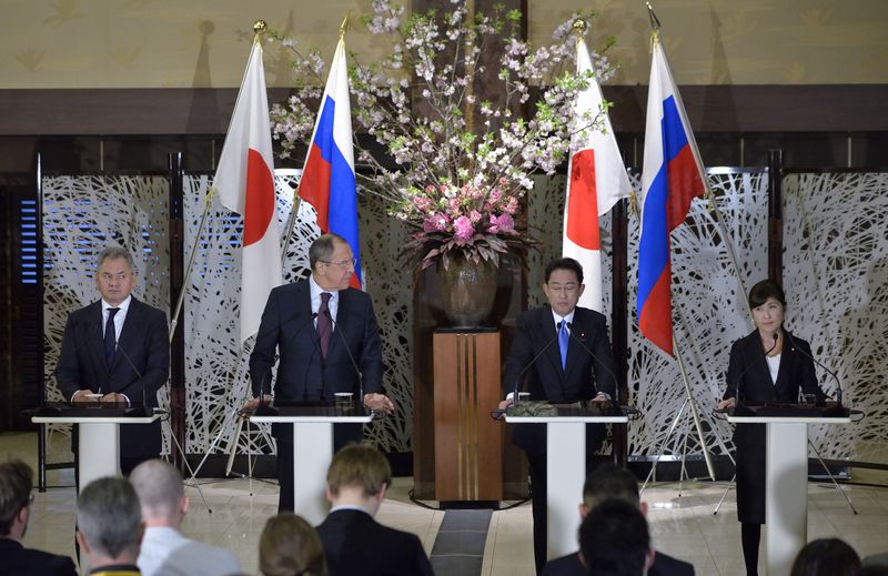 &copy; Reuters. Russia's Foreign Minister Sergey Lavrov (2ndL) and Defense Minister Sergei Shoigu (L) attend a joint news conference with Japan's Foreign Minister Fumio Kishida (2nd-R) and Defense Minister Tomomi Inada (R) following the two-plus-two Foreign and Defense M