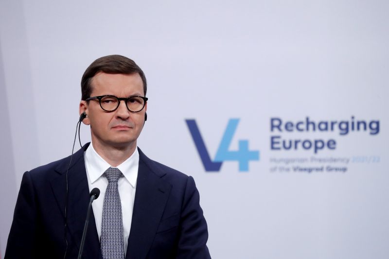 &copy; Reuters. Poland's Prime Minister Mateusz Morawiecki attends a news conference after a meeting of the Visegrad Group countries in Budapest, Hungary, October 12, 2021. REUTERS/Bernadett Szabo