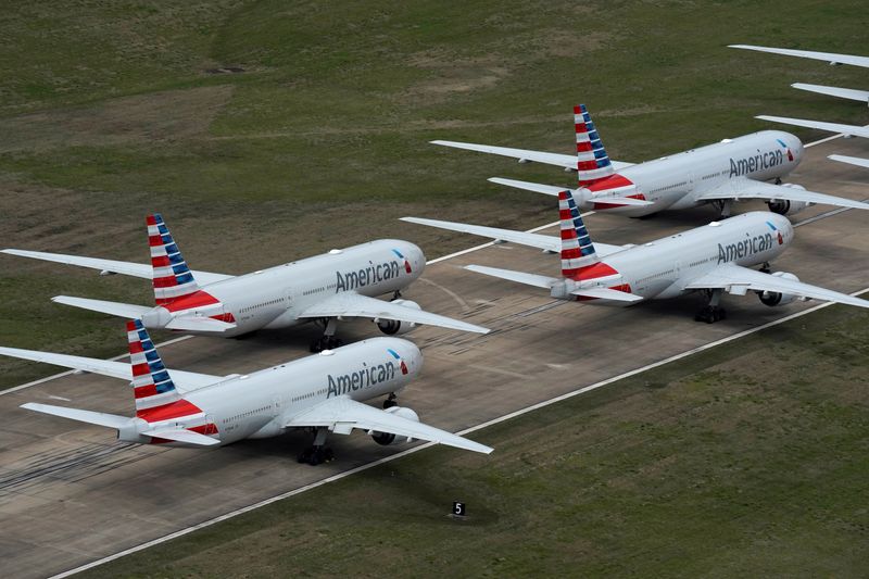 &copy; Reuters. FILE PHOTO: American Airlines passenger planes crowd a runway where they are parked due to flight reductions to slow the spread of coronavirus disease (COVID-19), at Tulsa International Airport in Tulsa, Oklahoma, U.S. March 23, 2020. REUTERS/Nick Oxford/