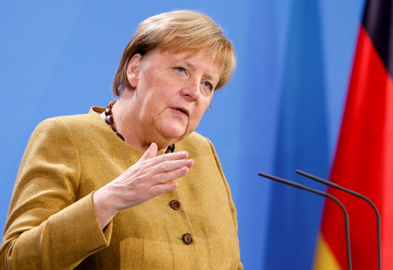 &copy; Reuters. FILE PHOTO: German Chancellor Angela Merkel addresses the media during a statement following an online G20 summit on the current situation in Afghanistan, in Berlin, Germany, October 12,2021. REUTERS/Michele Tantussi