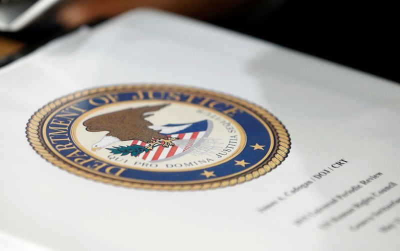 &copy; Reuters. FILE PHOTO: A folder with the seal of the U.S. Department of Justice sits on a table at the United Nations European headquarters in Geneva, Switzerland, May 11, 2015.   REUTERS/Denis Balibouse/File Photo