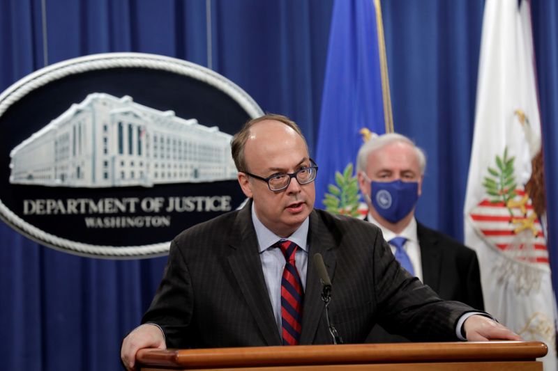 &copy; Reuters. FILE PHOTO: Acting Assistant U.S. Attorney General Jeffrey Clark speaks next to Deputy U.S. Attorney General Jeffrey Rosen at a news conference at the Justice Department in Washington, U.S., October 21, 2020. REUTERS/Yuri Gripas/Pool/File Photo