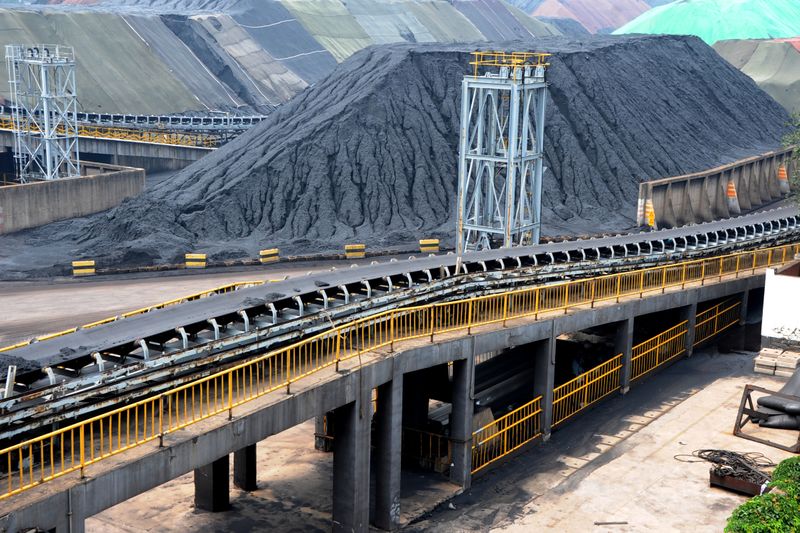 &copy; Reuters. Piles of imported coal are seen at a coal terminal of a port in Lianyungang, Jiangsu province, China July 26, 2018. Picture taken July 26, 2018.  REUTERS/Stringer/Files