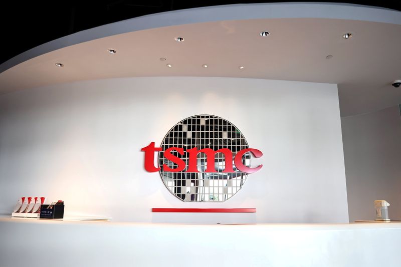 &copy; Reuters. FILE PHOTO: The logo of Taiwan Semiconductor Manufacturing Co (TSMC) is pictured at its headquarters in Hsinchu, Taiwan, January 19, 2021. REUTERS/Ann Wang/File Photo  GLOBAL BUSINESS WEEK AHEAD