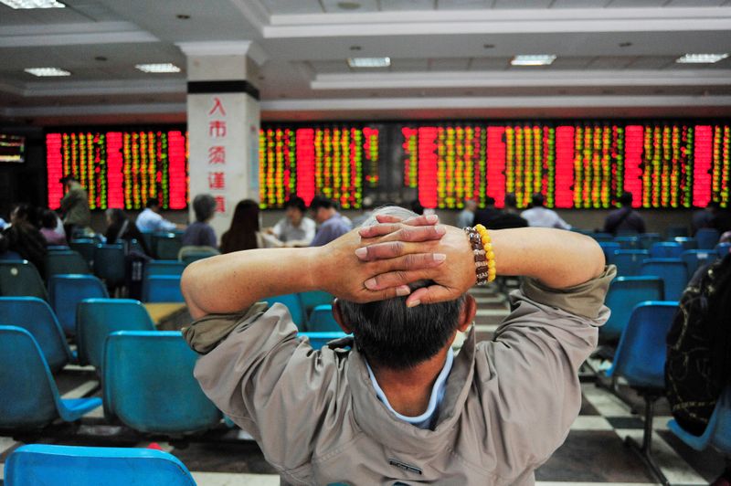 &copy; Reuters. An investor looks at an electronic board showing stock information at a brokerage house in Nanjing, China May 24, 2017. REUTERS/Stringer ATTENTION EDITORS - THIS IMAGE WAS PROVIDED BY A THIRD PARTY. EDITORIAL USE ONLY. CHINA OUT.