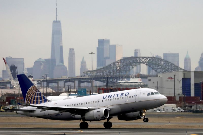 &copy; Reuters. FILE PHOTO: A United Airlines passenger jet takes off with New York City as a backdrop, at Newark Liberty International Airport, New Jersey, U.S. December 6, 2019. REUTERS/Chris Helgren 