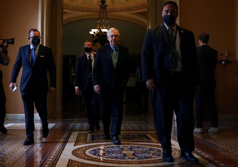 &copy; Reuters. FILE PHOTO: U.S. Senate Republican Leader Mitch McConnell (R-KY) walks to his office after it was announced that the U.S. Senate reached a deal to pass a $480 billion increase in Treasury Department borrowing authority, at the U.S. Capitol in Washington, 