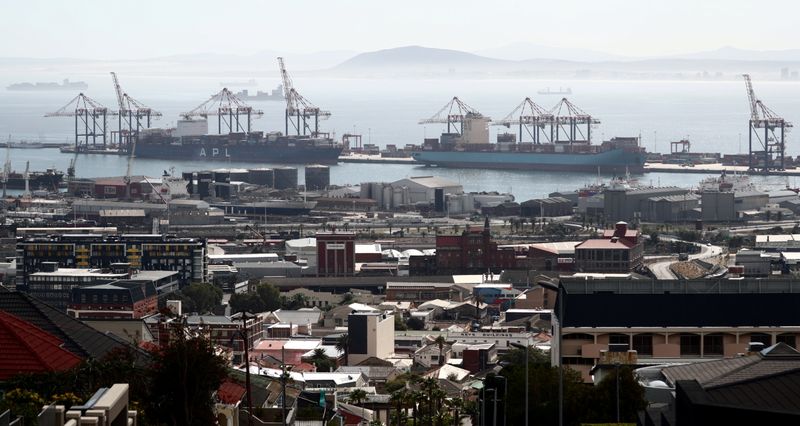&copy; Reuters. FILE PHOTO: Container ships wait to load and offload goods in port during a 21-day nationwide lockdown aimed at limiting the spread of coronavirus disease (COVID-19) in  Cape Town, South Africa, April 17, 2020. REUTERS/Mike Hutchings