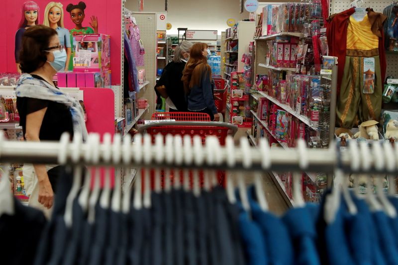 &copy; Reuters. FILE PHOTO: People shop for clothes at a Target retail chain in Westbury, New York, U.S., May 20, 2021. REUTERS/Shannon Stapleton 