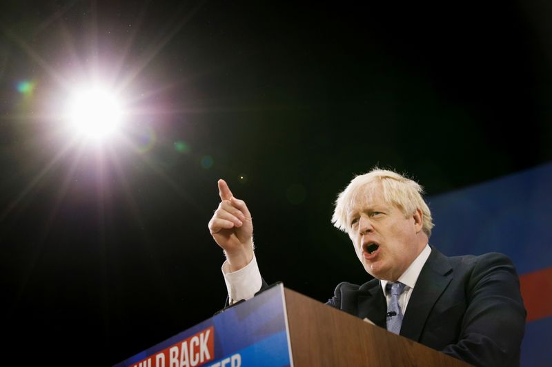 &copy; Reuters. Britain's Prime Minister Boris Johnson gestures as he delivers a speech during the annual Conservative Party Conference, in Manchester, Britain, October 6, 2021. REUTERS/Phil Noble/Files