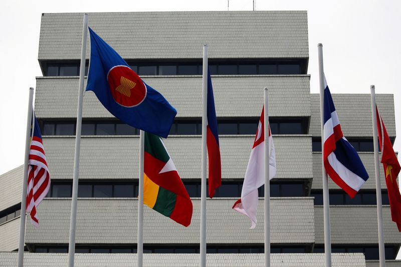 &copy; Reuters. FILE PHOTO: Flags are seen outside the Association of Southeast Asian Nations (ASEAN) secretariat building, ahead of the ASEAN leaders' meeting in Jakarta, Indonesia, April 23, 2021. REUTERS/Willy Kurniawan/File Photo
