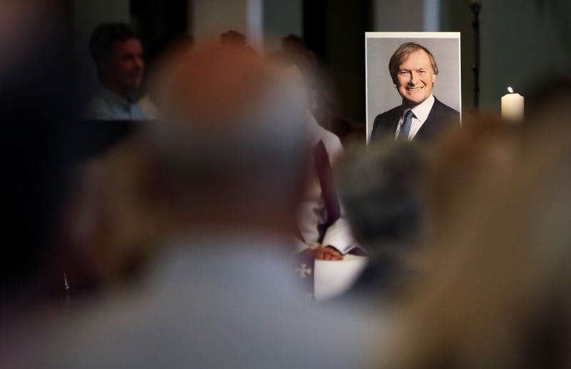 © Reuters. A service of reflection is held in memory of British MP David Amess, who was stabbed to death during a meeting with constituents, at the church of St Michael's and all Angels, in Leigh-on-Sea, Britain, October 17, 2021. REUTERS/Chris Radburn
