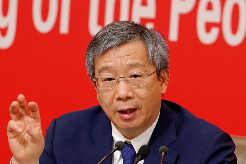 &copy; Reuters. FILE PHOTO: Governor of People's Bank of China (PBOC) Yi Gang attends a news conference on China's economic development ahead of the 70th anniversary of its founding, in Beijing, China September 24, 2019. REUTERS/Florence Lo/File Photo