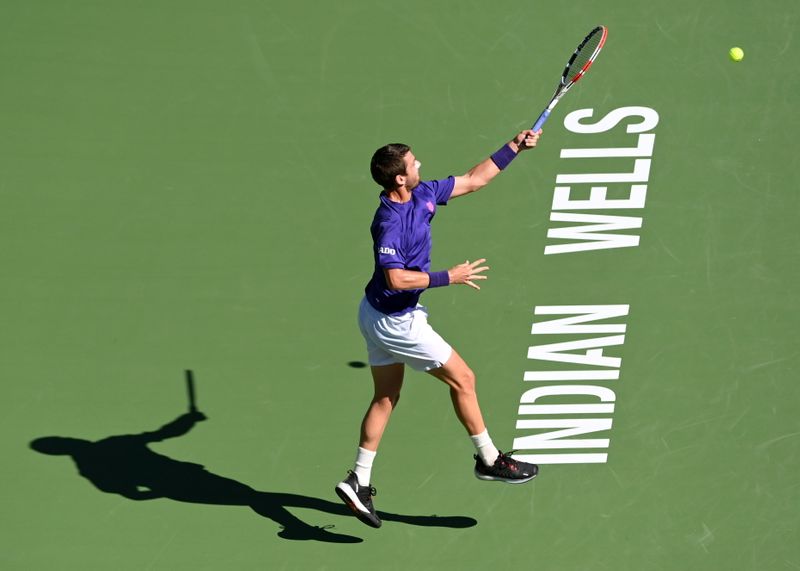 &copy; Reuters. Oct 16, 2021; Indian Wells, CA, USA;  Cameron Norrie (GBR) hits a shot as he defeats Grigor Dimitrov (BUL) in the semifinal match at the BNP Paribas Open at the Indian Wells Tennis Garden. Mandatory Credit: Jayne Kamin-Oncea-USA TODAY Sports     