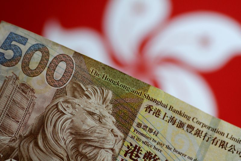 &copy; Reuters. FILE PHOTO: A Hong Kong dollar note is seen in this illustration photo May 31, 2017.     REUTERS/Thomas White/Illustration