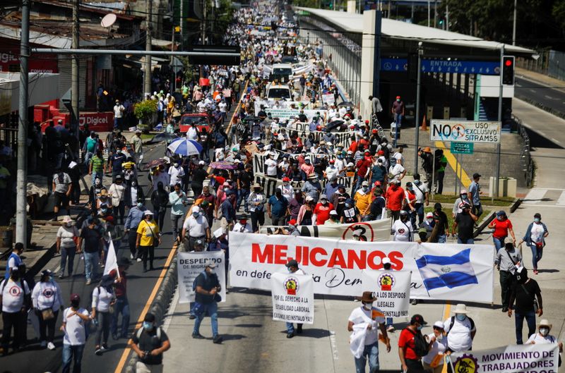 &copy; Reuters. People take part in a protest against actions by the government of El Salvador's President Nayib Bukele, as the use of bitcoin and legal reforms to extend his term, in San Salvador, El Salvador October 17, 2021. REUTERS/Jose Cabezas