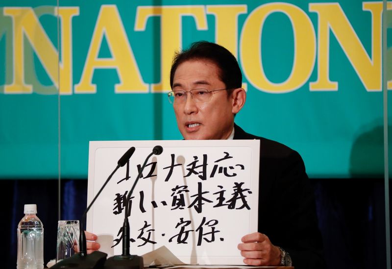 &copy; Reuters. Primeiro-ministro do Japão, Fumio Kishida, durante debate em Tóquio
18/10/2021 REUTERS/Issei Kato/Pool