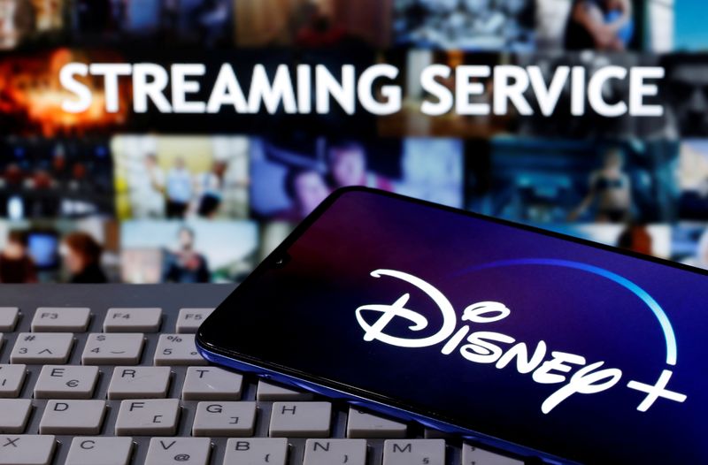 &copy; Reuters. FILE PHOTO:  A smartphone with the "Disney" logo is seen on a keyboard in front of the words "Streaming service" in this picture illustration taken March 24, 2020. REUTERS/Dado Ruvic