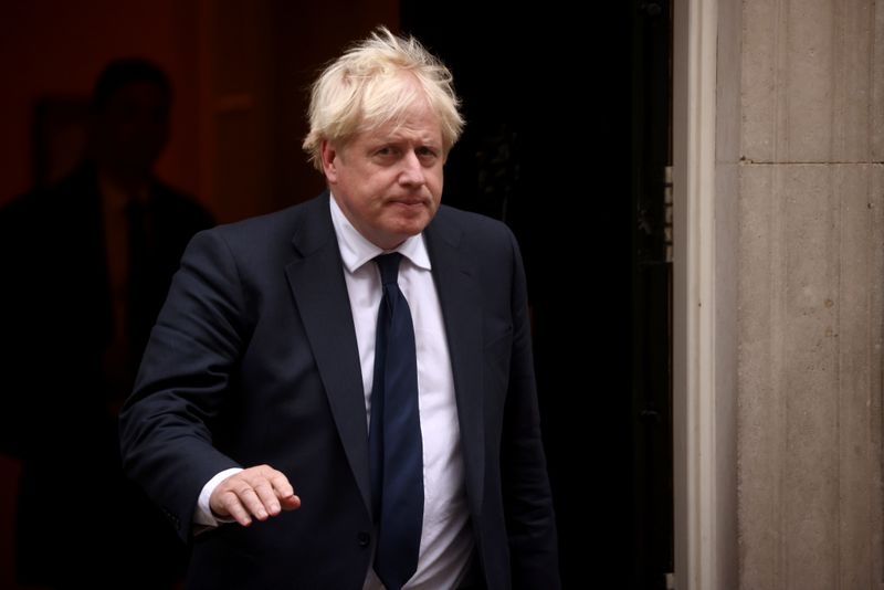 &copy; Reuters. Britain's Prime Minister Boris Johnson walks outside Downing Street, following the death of British MP David Amess who was stabbed to death during a meeting with constituents, in London, Britain, October 18, 2021. REUTERS/Henry Nicholls
