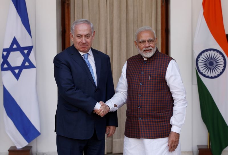 &copy; Reuters. FILE PHOTO: Israeli Prime Minister Benjamin Netanyahu shakes hands with his Indian counterpart Narendra Modi during a photo opportunity ahead of their meeting at Hyderabad House in New Delhi, India, January 15, 2018. REUTERS/Adnan Abidi/File Photo