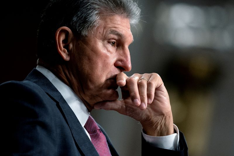 &copy; Reuters. FILE PHOTO: U.S. Senator Joe Manchin (D-WV) pauses during a Senate Armed Services Committee hearing on the conclusion of military operations in Afghanistan and plans for future counterterrorism operations, on Capitol Hill in Washington, U.S., September 28