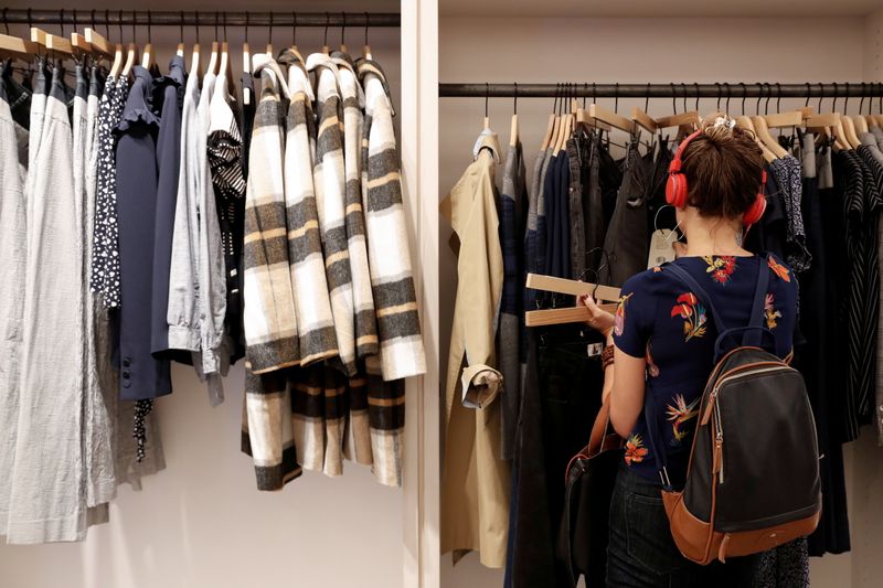 &copy; Reuters. FILE PHOTO: A woman looks at clothes at the Rent The Runway store, an online subscription service for women to rent designer dress and accessory items, in New York City, New York, U.S., September 12, 2019. Picture taken September 12, 2019. REUTERS/Shannon