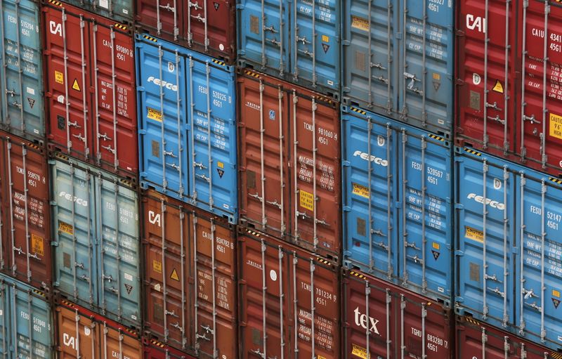 &copy; Reuters. Stacked shipping containers are pictured at a commercial port in Vladivostok, Russia October 18, 2021. REUTERS/Tatiana Meel