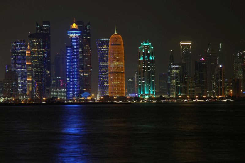 &copy; Reuters. FILE PHOTO: Night scene of the skyline of Doha with towers are seen at Al Dafna Area in Doha, Qatar, October 20, 2019. REUTERS/Naseem Zeitoon/File Photo