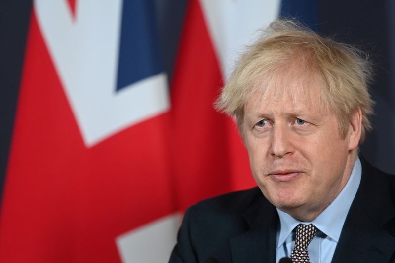 &copy; Reuters. FILE PHOTO: British Prime Minister Boris Johnson holds a news conference in Downing Street on the outcome of the Brexit negotiations, in London, Britain December 24, 2020. Paul Grover /Pool via REUTERS/File Photo
