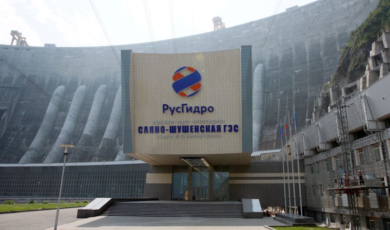 &copy; Reuters. A logo of the RusHydro company, that operates the Russia's largest hydroelectric power station, Sayano-Shushenskaya, is seen above an entrance of the station, near the Siberian village of Cheryomushki, in the Republic of Khakassia, Russia July 22, 2019. P
