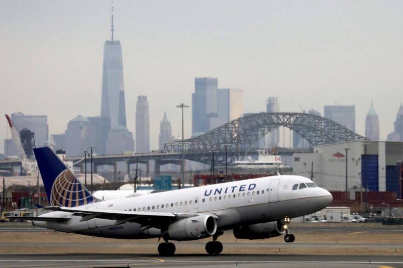 &copy; Reuters. FILE PHOTO: A United Airlines passenger jet takes off with New York City as a backdrop, at Newark Liberty International Airport, New Jersey, U.S. December 6, 2019. REUTERS/Chris Helgren/File Photo