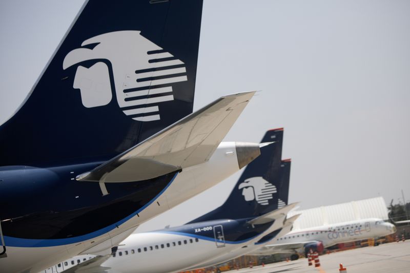 &copy; Reuters. Aeromexico airplanes are pictured at the Benito Juarez International airport, in Mexico City, Mexico, July 14, 2021. Picture taken July 14, 2021. REUTERS/Luis Cortes/Files