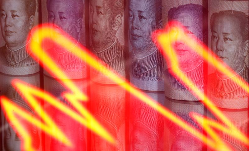 &copy; Reuters. Chinese Yuan banknotes are seen behind illuminated stock graph in this illustration taken February 10, 2020. REUTERS/Dado Ruvic/Illustration