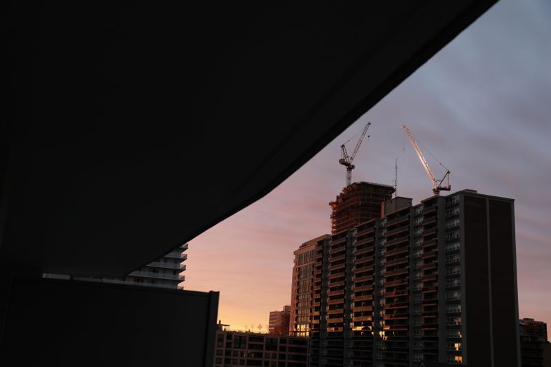 &copy; Reuters. FILE PHOTO: An apartment building is lit by the dawn sun in Toronto, Ontario, Canada April 23, 2020. Picture taken April 23, 2020. REUTERS/Chris Helgren